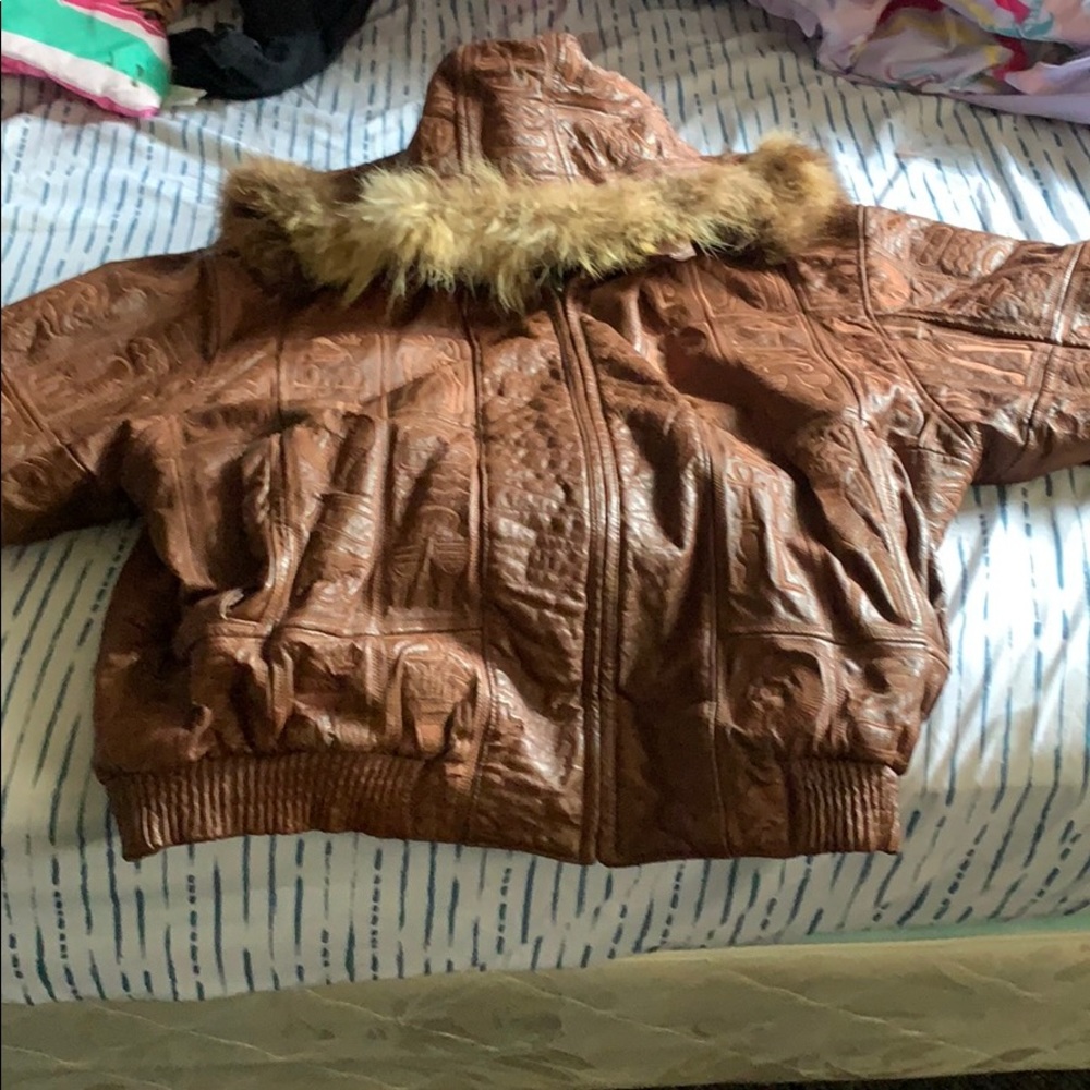 Real leather Vilanto winter coat with fur hood.